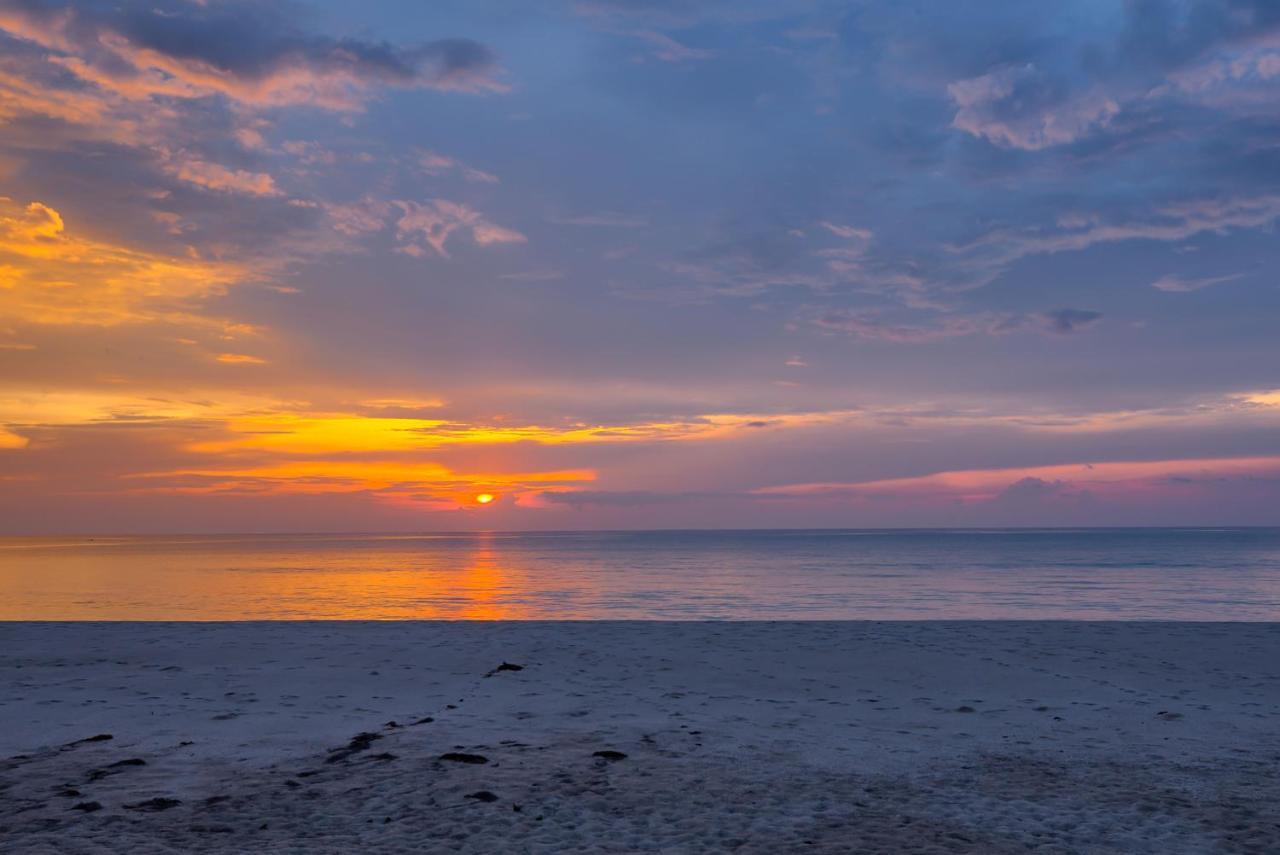 Outrigger Khao Lak Beach Resort - Sha Extra Plus Экстерьер фото Sunset over the Gulf of Riga