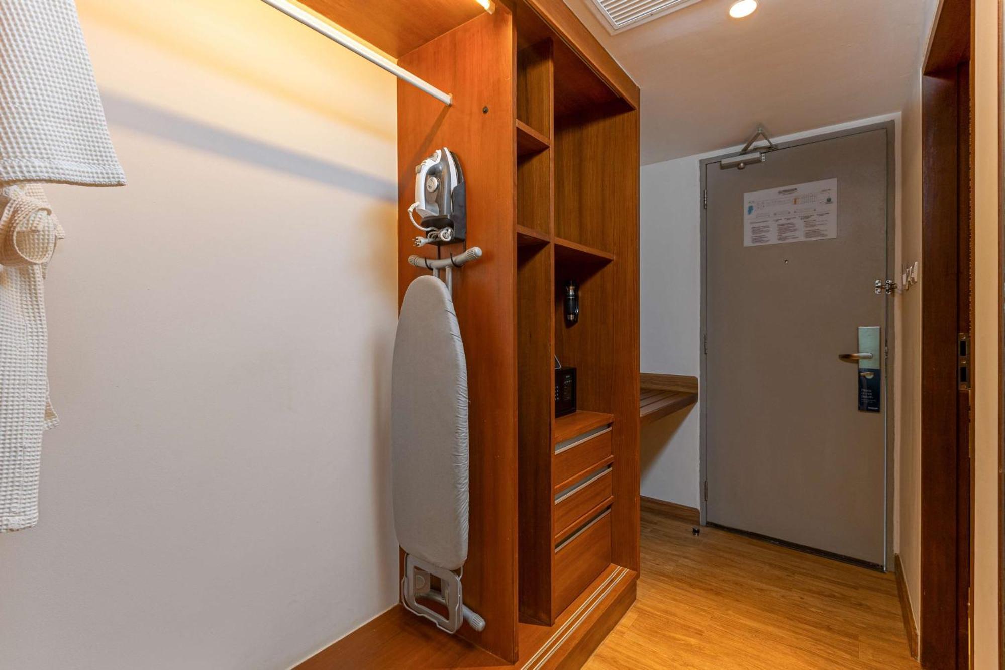 Outrigger Khao Lak Beach Resort - Sha Extra Plus Экстерьер фото A steam iron and ironing board in a hotel room