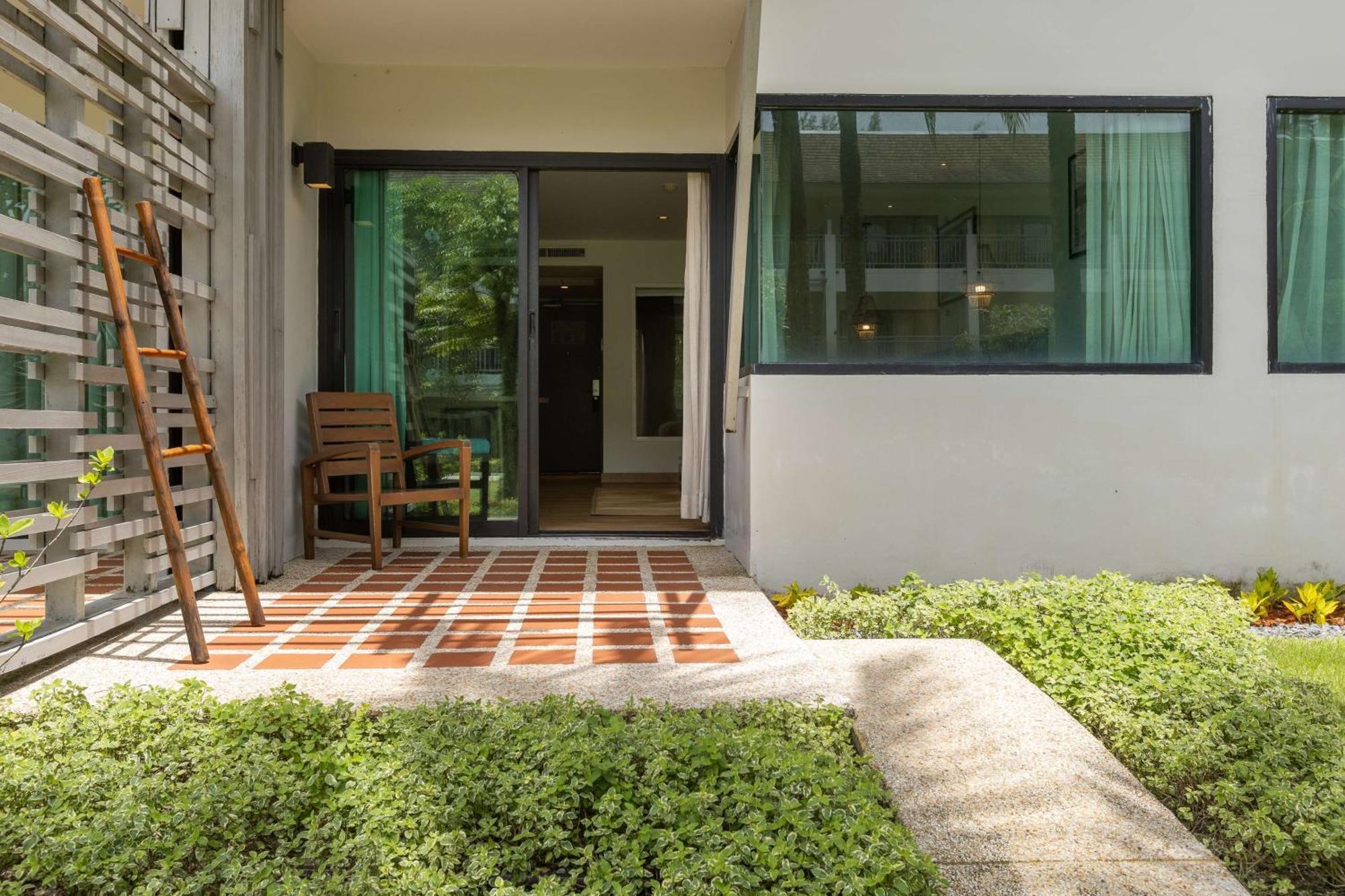 Outrigger Khao Lak Beach Resort - Sha Extra Plus Экстерьер фото A typical house in the village
